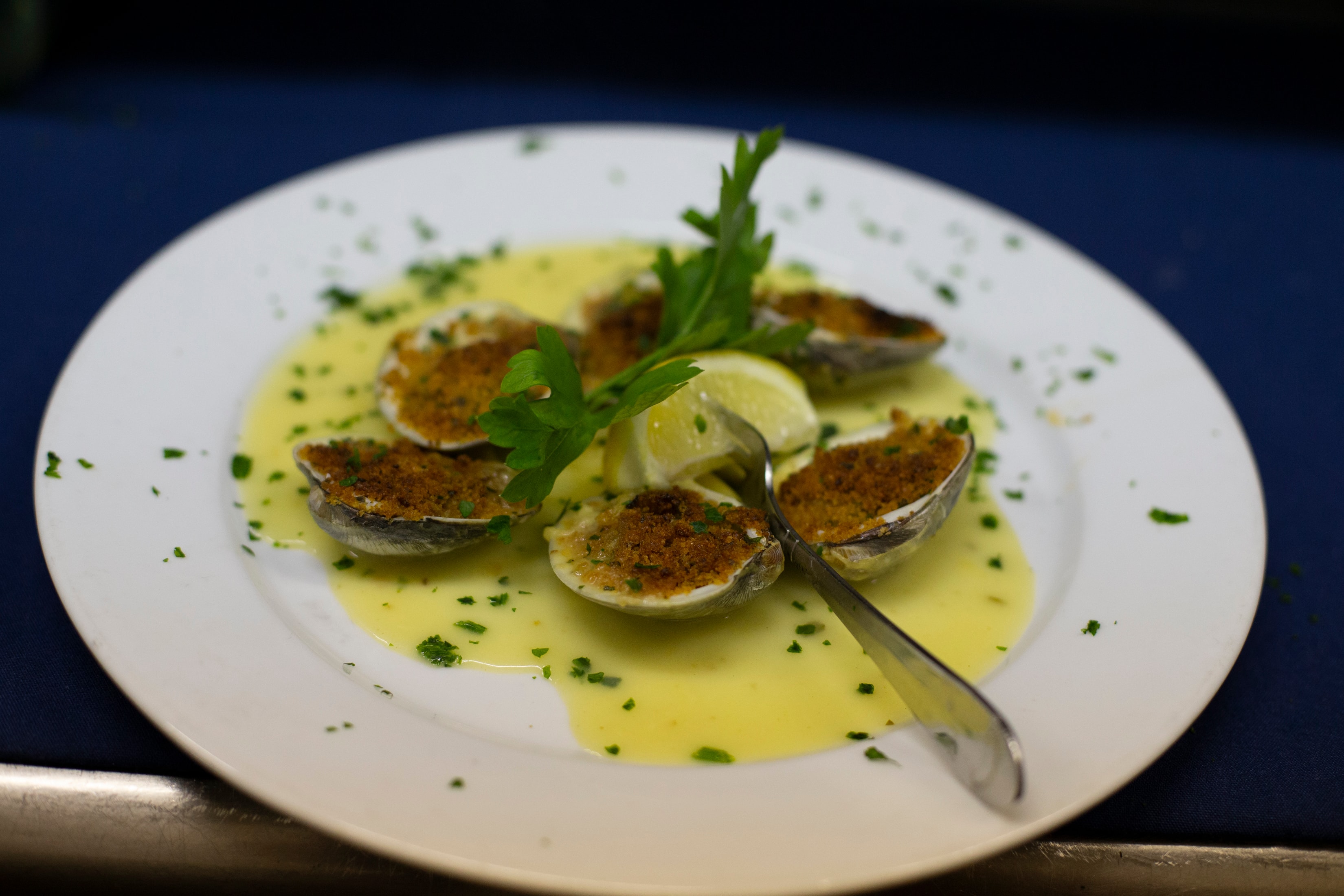 Clams oreganata with lemon butter sauce