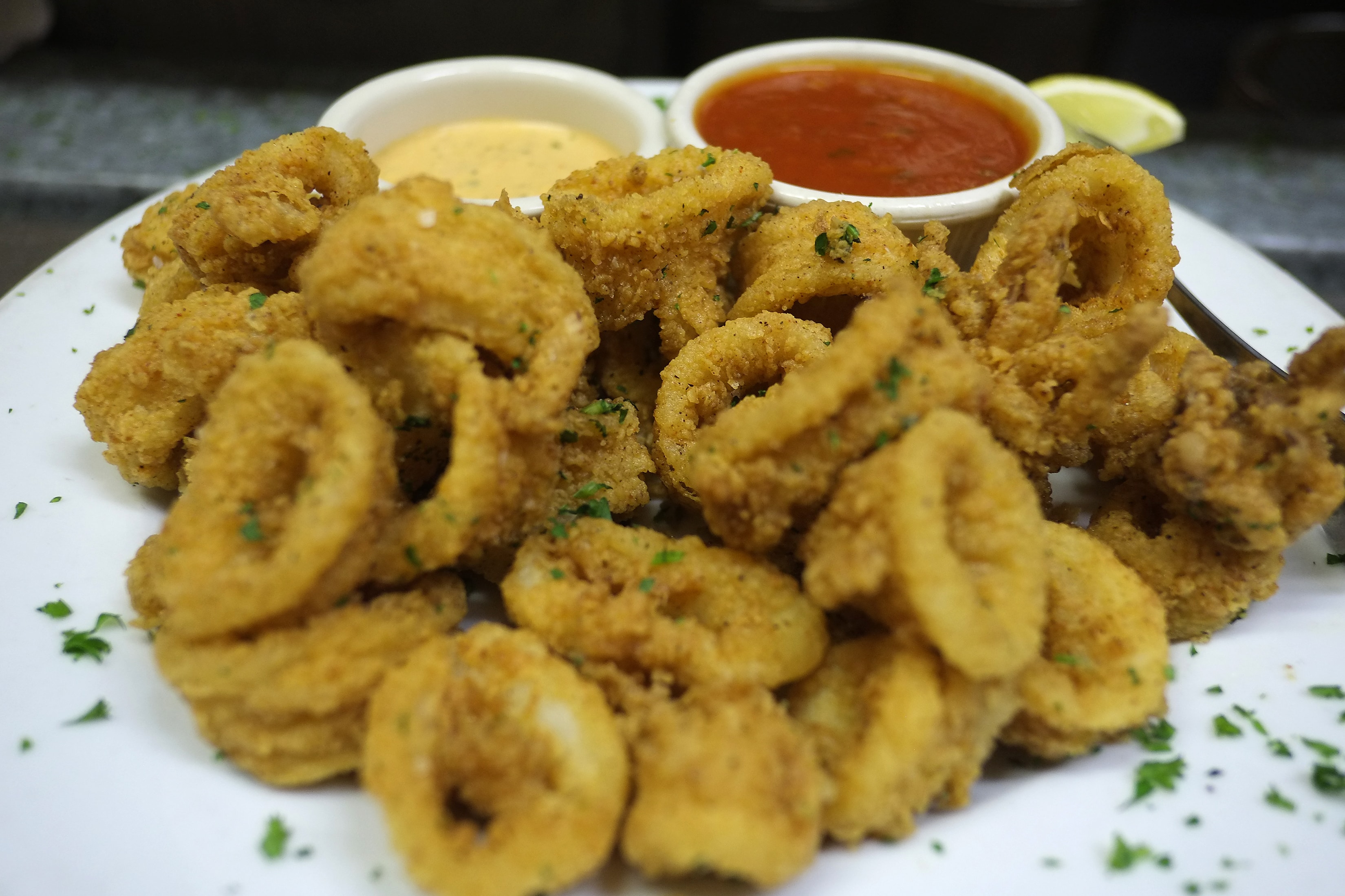 Fried calamari with dipping sauces