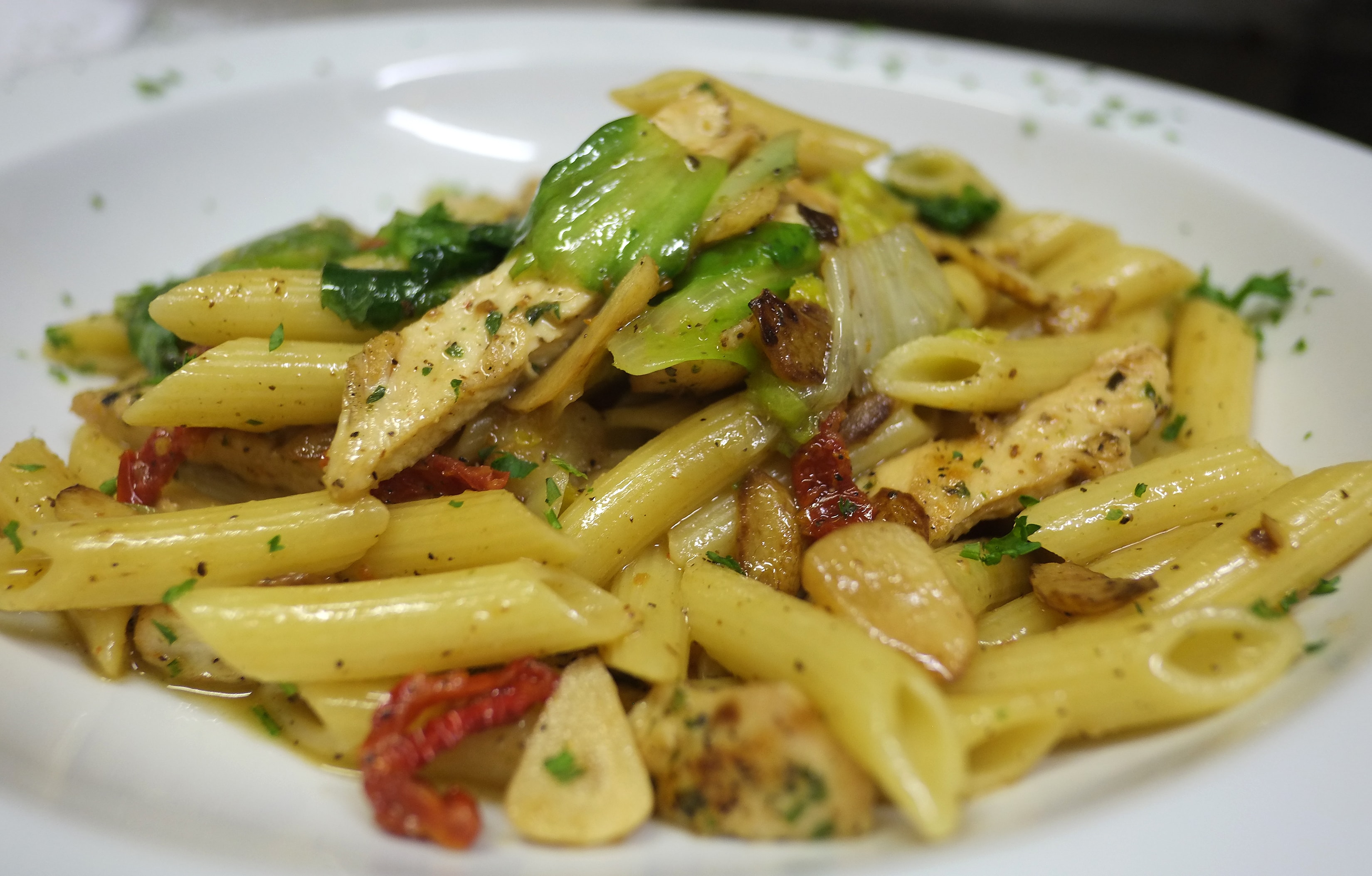 Penne with chicken, sun-dried tomatoes and escarole